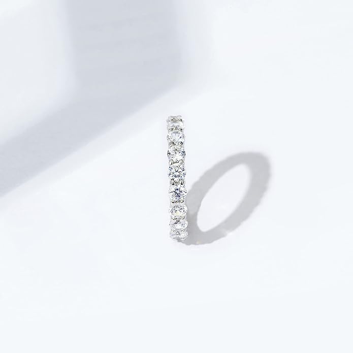Amazon Essentials Platinum or Gold Plated Sterling Silver All-Around Band Ring set with Round Infinite Elements Cubic Zirconia