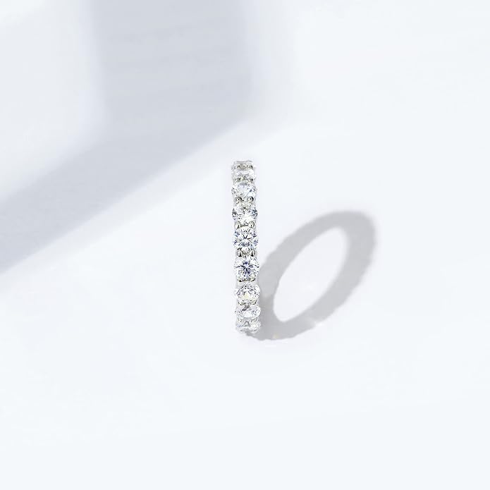 Amazon Essentials Platinum or Gold Plated Sterling Silver All-Around Band Ring set with Round Infinite Elements Cubic Zirconia