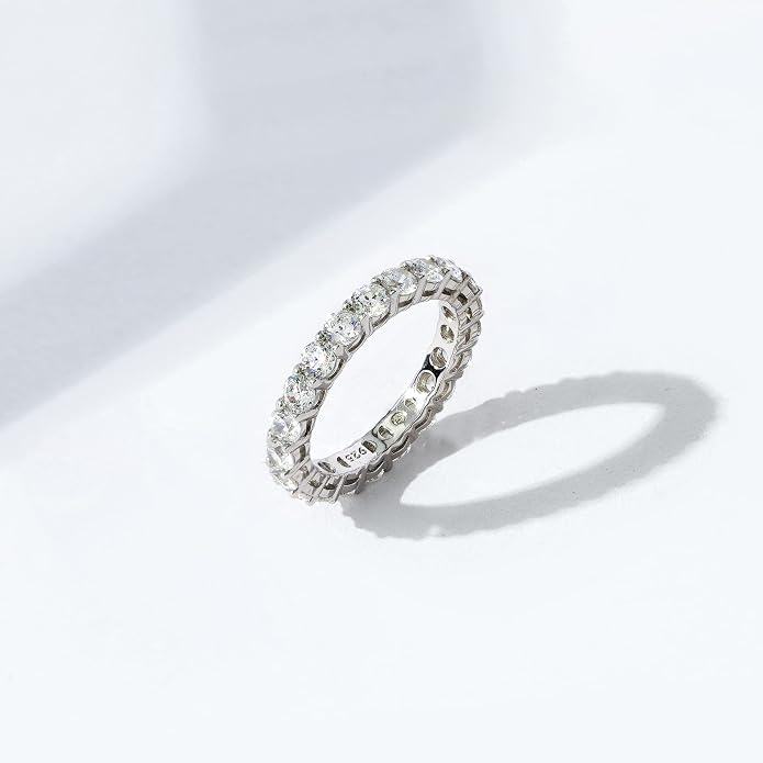 Amazon Essentials Platinum or Gold Plated Sterling Silver All-Around Band Ring set with Round Infinite Elements Cubic Zirconia
