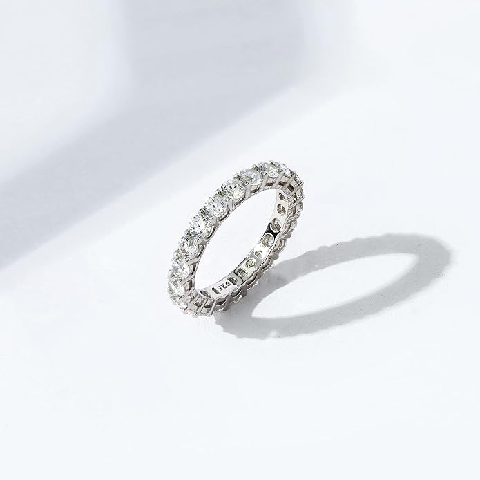Amazon Essentials Platinum or Gold Plated Sterling Silver All-Around Band Ring set with Round Infinite Elements Cubic Zirconia