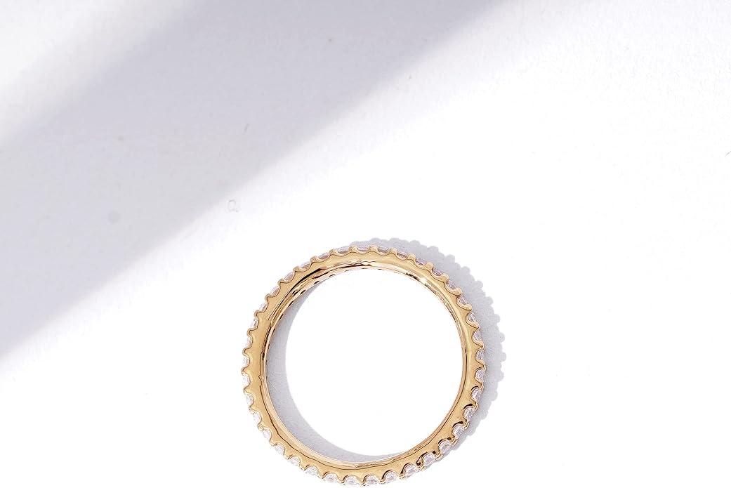 Amazon Essentials Platinum or Gold Plated Sterling Silver All-Around Band Ring set with Round Infinite Elements Cubic Zirconia