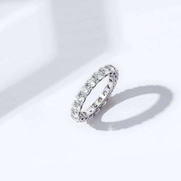 Amazon Essentials Platinum or Gold Plated Sterling Silver All-Around Band Ring set with Round Infinite Elements Cubic Zirconia