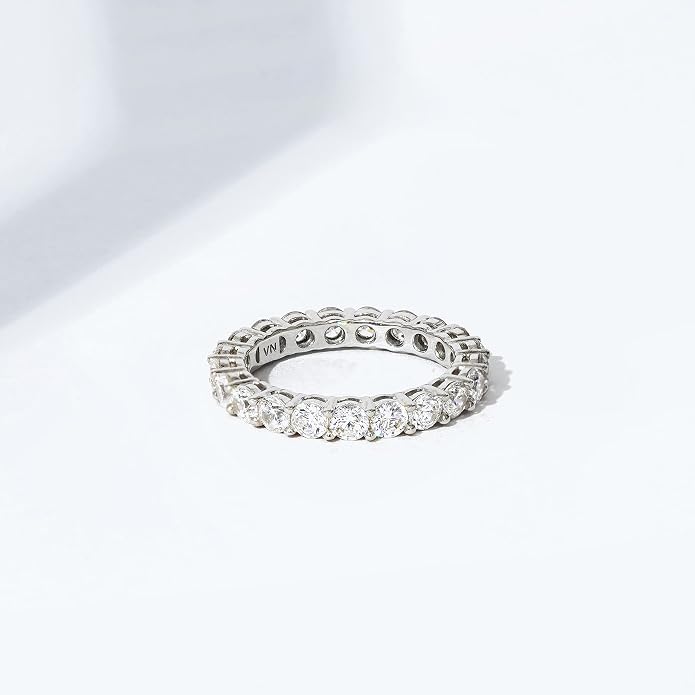 Amazon Essentials Platinum or Gold Plated Sterling Silver All-Around Band Ring set with Round Infinite Elements Cubic Zirconia