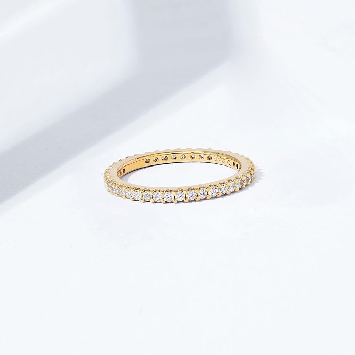 Amazon Essentials Platinum or Gold Plated Sterling Silver All-Around Band Ring set with Round Infinite Elements Cubic Zirconia