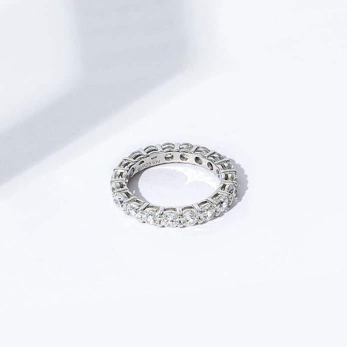 Amazon Essentials Platinum or Gold Plated Sterling Silver All-Around Band Ring set with Round Infinite Elements Cubic Zirconia
